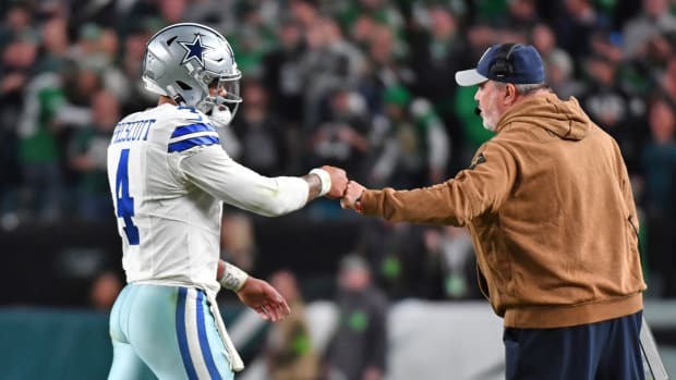 Nov 5, 2023; Philadelphia, Pennsylvania, USA; Dallas Cowboys quarterback Dak Prescott (4) and head coach Mike McCarthy after a touchdown in the third quarter against the Philadelphia Eagles at Lincoln Financial Field. 